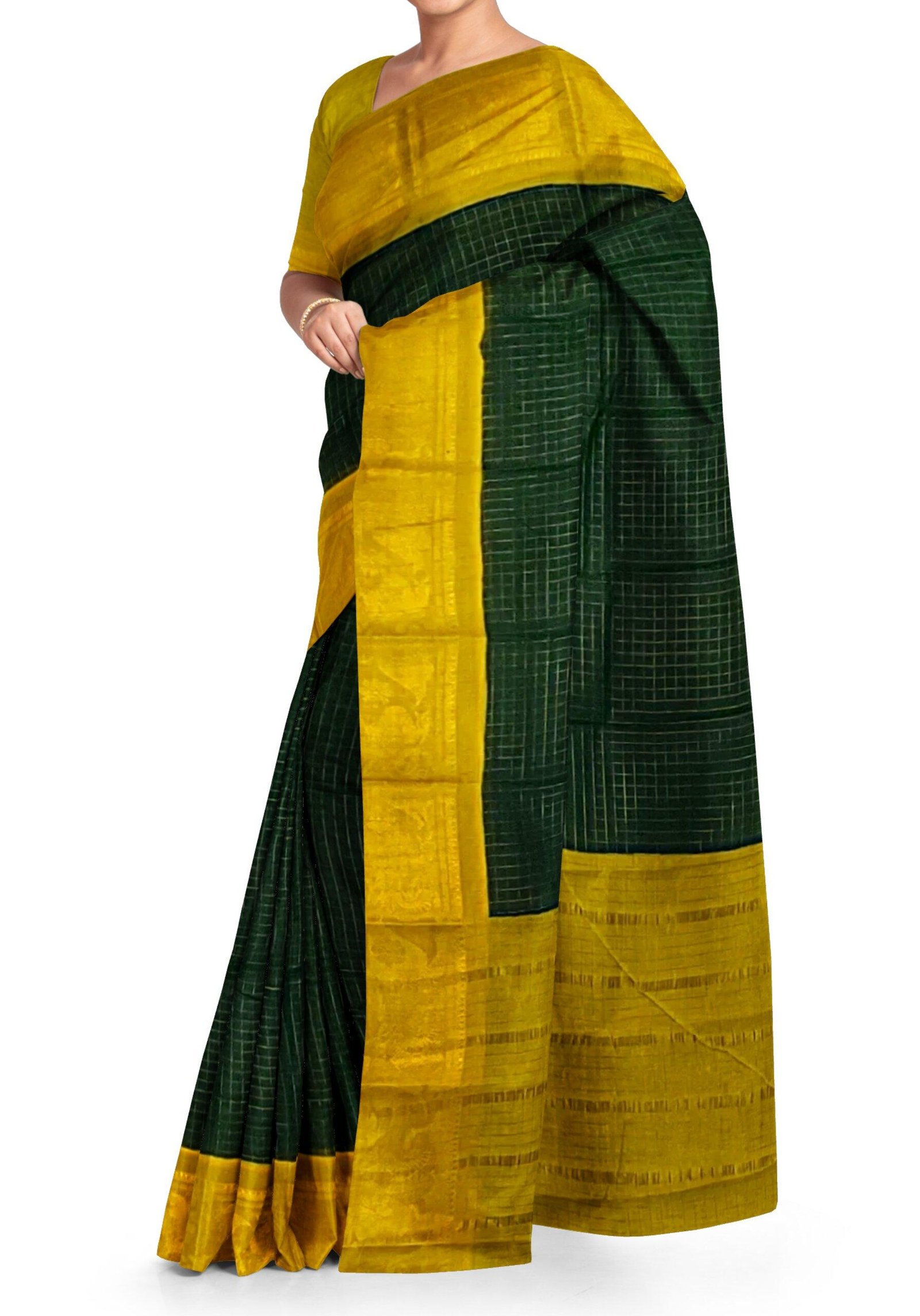 dark green saree with yellow border